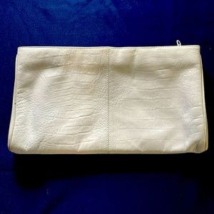 A real leather bag. In good condition. White.